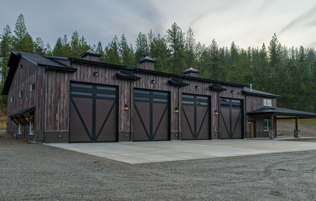 A barndominium with custom doors to match the siding from Metal America