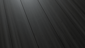 The burnt black wood like finish available on steel siding panels from Metal America