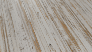 The chippy white wood like finish available on steel siding panels from Metal America