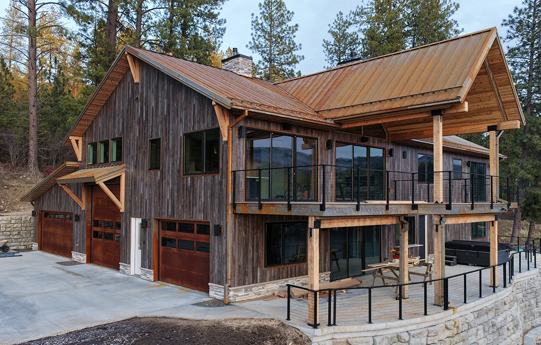Cor-Ten Roof and Overhead Doors, Barnwood Siding, Smooth Cedar Accents