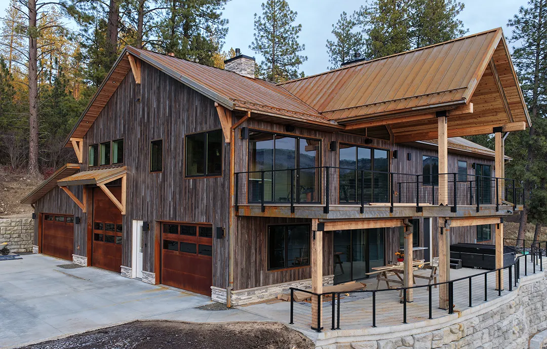 Cor-Ten Roof and Overhead Doors, Barnwood Siding, Smooth Cedar Accents