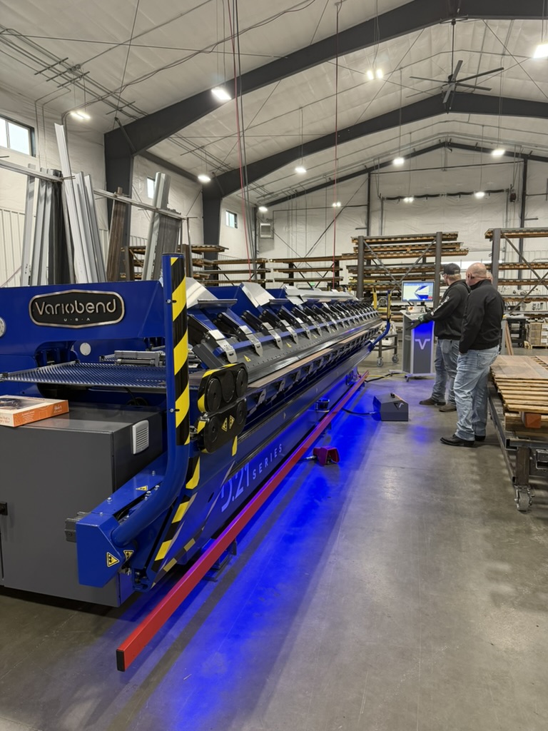 An automatic bending machine is Used at Metal Americas manufacturing facility to create custom bending profiles for steel panels