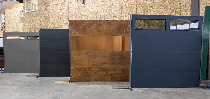 A row of custom garage doors at Metal America