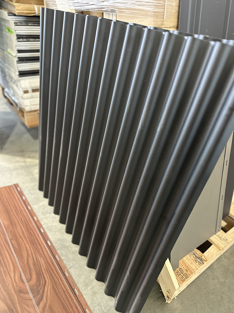 Steel panels of varying gauge or steel thickness are displayed