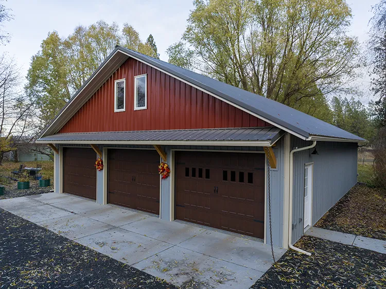 This multi-colored metal building has a light colored roof for energy efficiency
