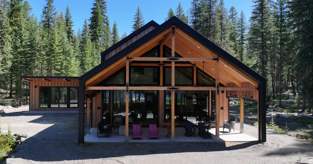 A pole building uses metal siding that looks like wood