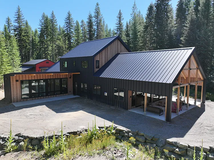 A barndominium with a metal roof that is quiet in the rain