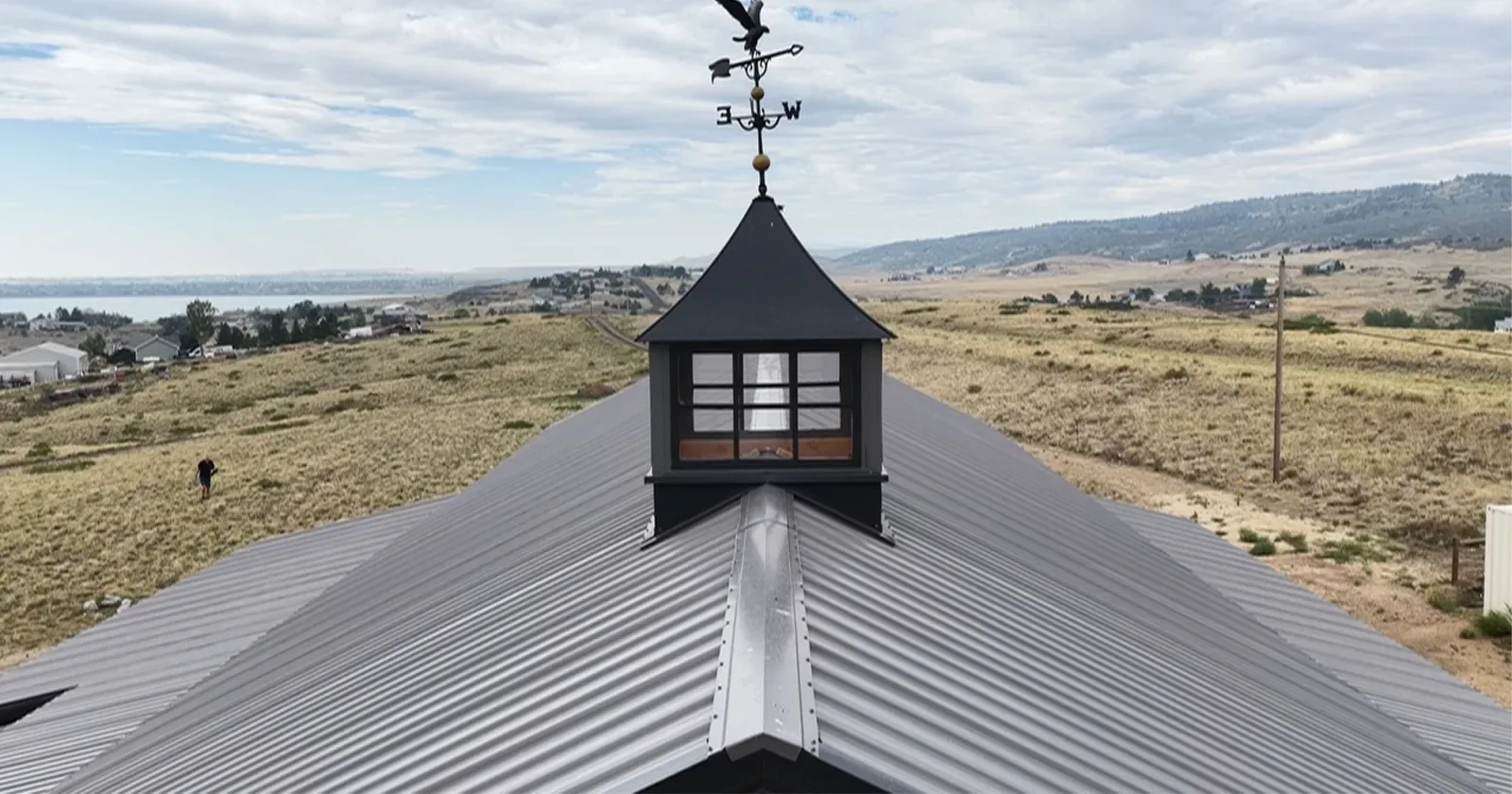 Metal roofing ridge cap and trim finishing the peak of a Metal America steel building