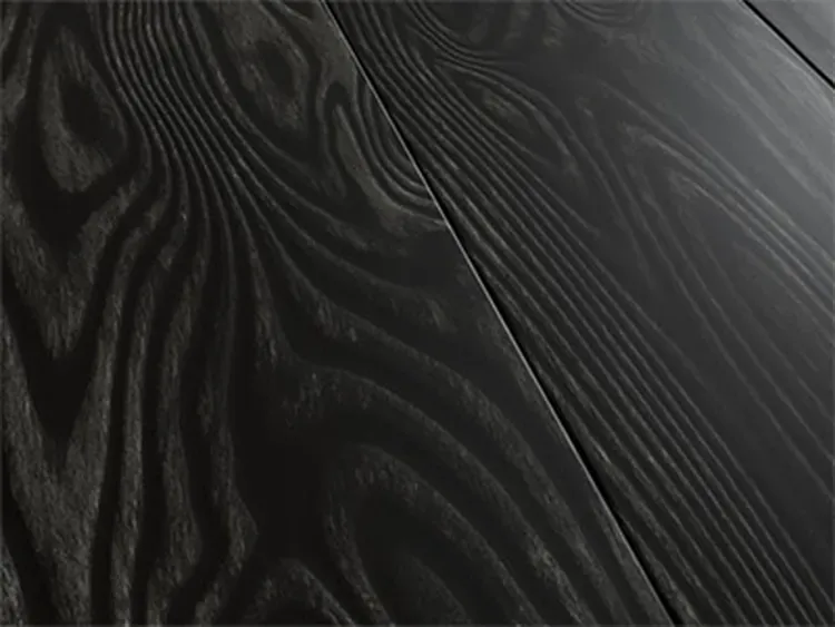 Charred black woodgrain specialty metal panel finish showing dark color options for metal roofing