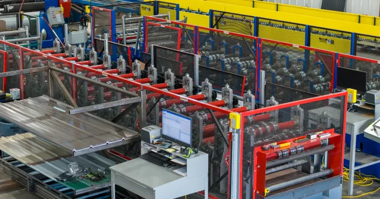Metal America roll-forming line making panels to length, the order stage of a roofing project timeline