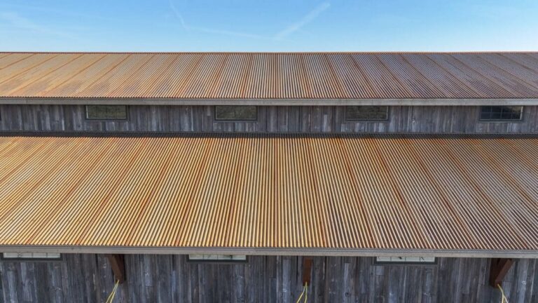 Covered lean-to walkway along Barnwood steel siding