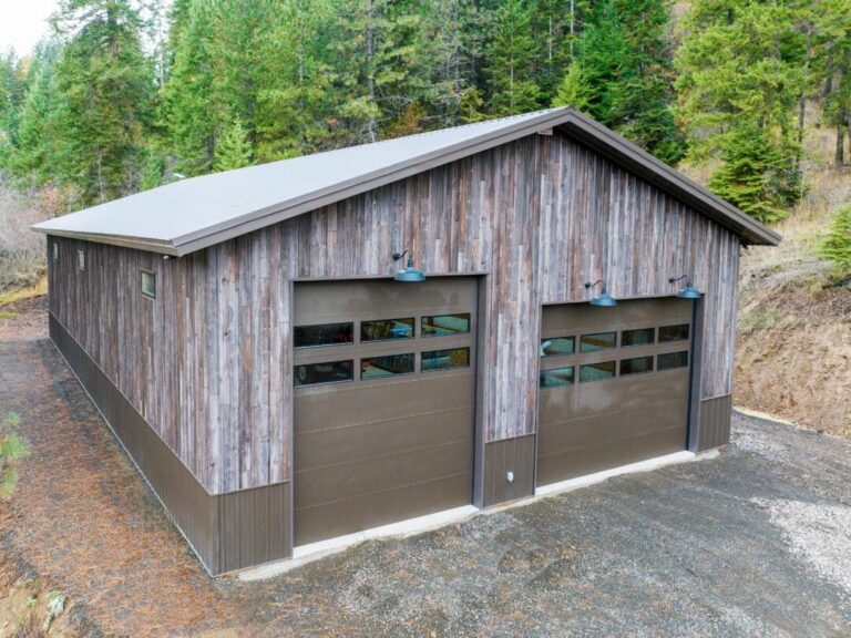 Gable end of a Barnwood steel pole barn with Burnished Slate wainscot
