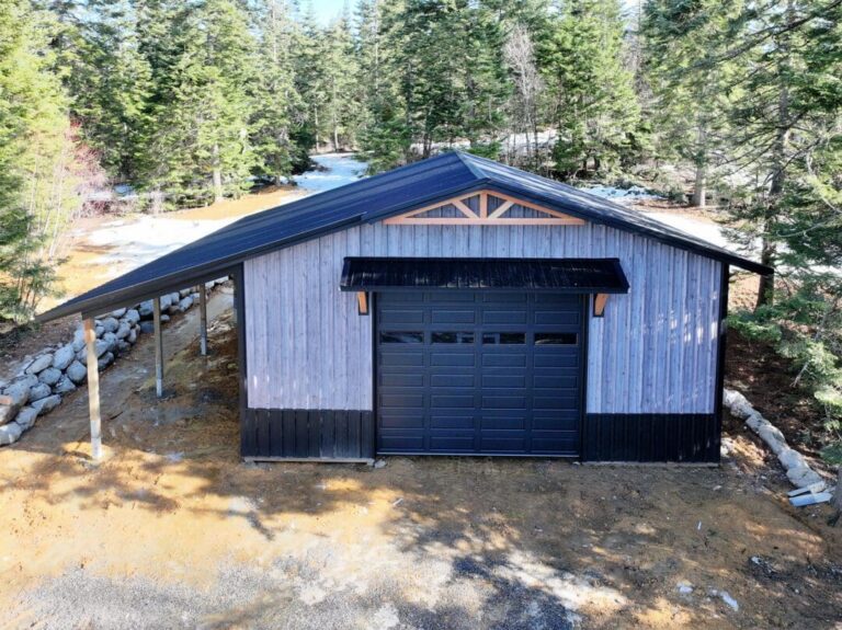 Rough Cedar Gray steel shop with an open lean-to and black trim