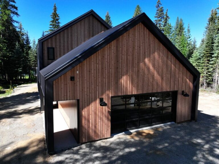 Garage wing sided in Smooth Cedar steel with a Gun Metal roof